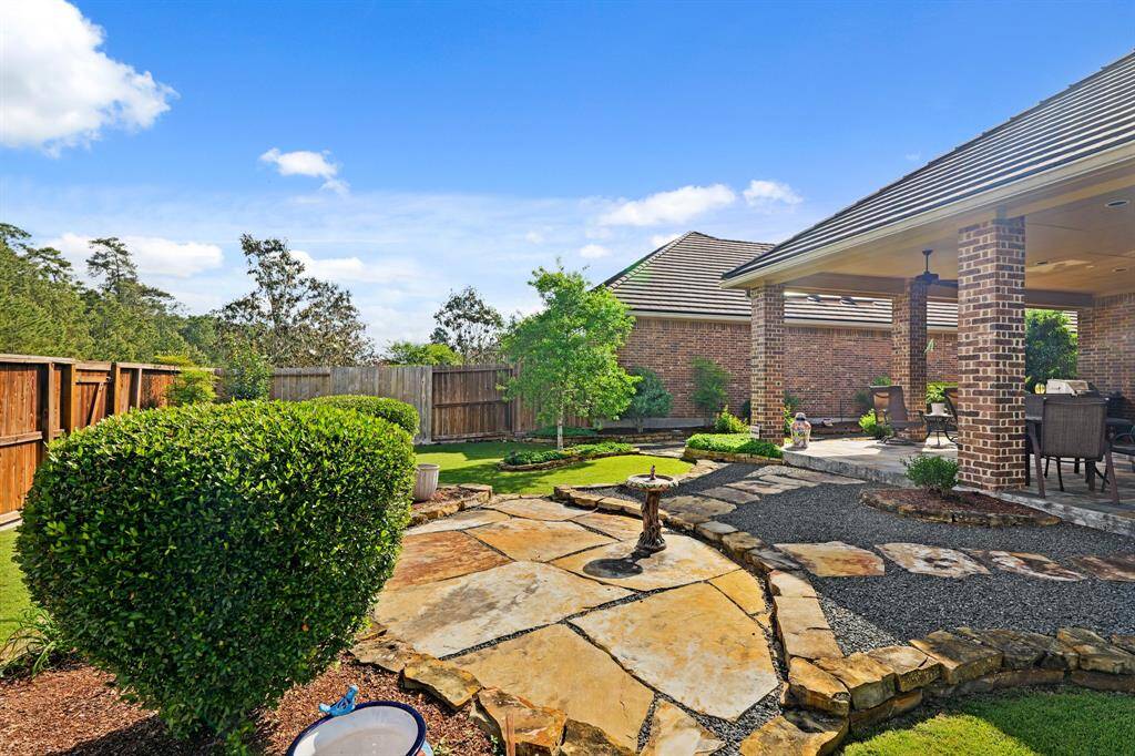 Absolutely lovely garden area....trees, stones, paths all perfectly blended.