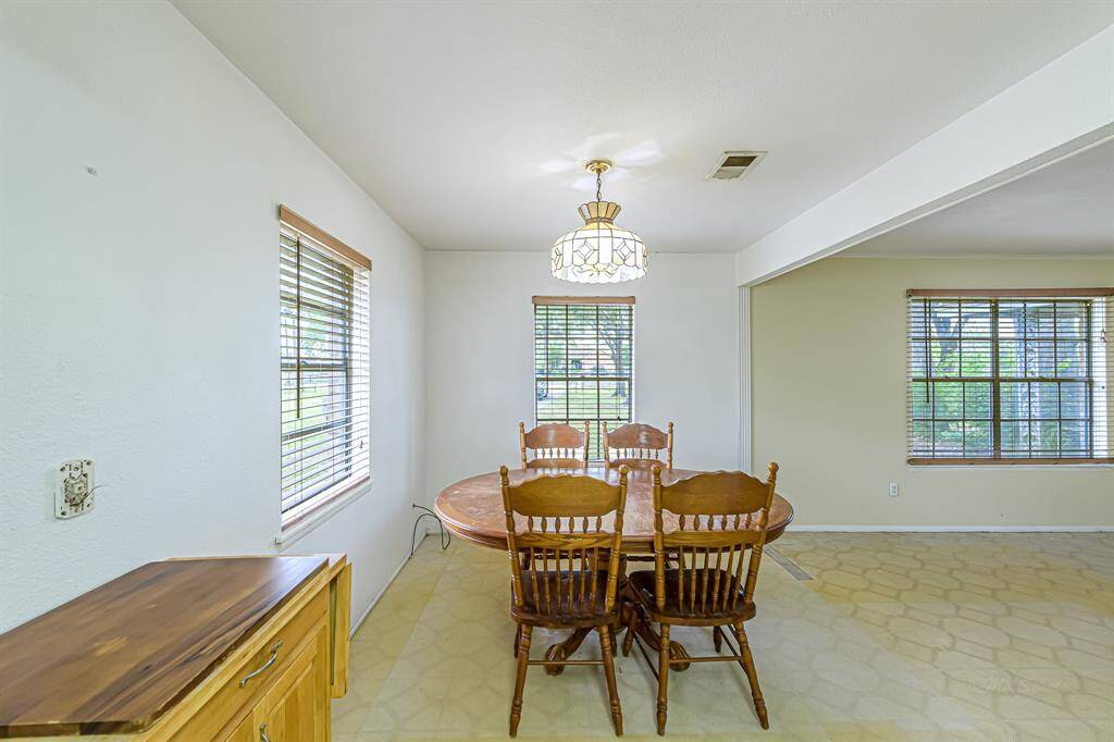 Another view of dining. Just look at all of the natural light into the space.