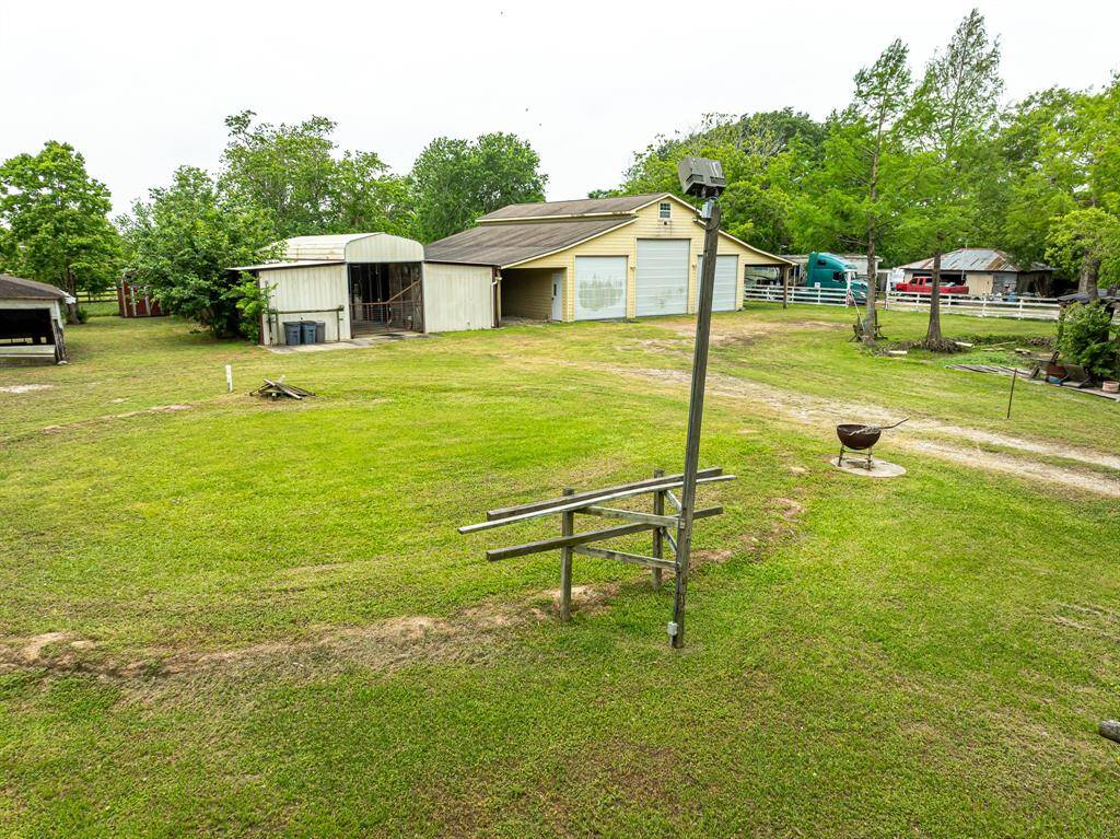 Workshop with adjacent horse stalls.