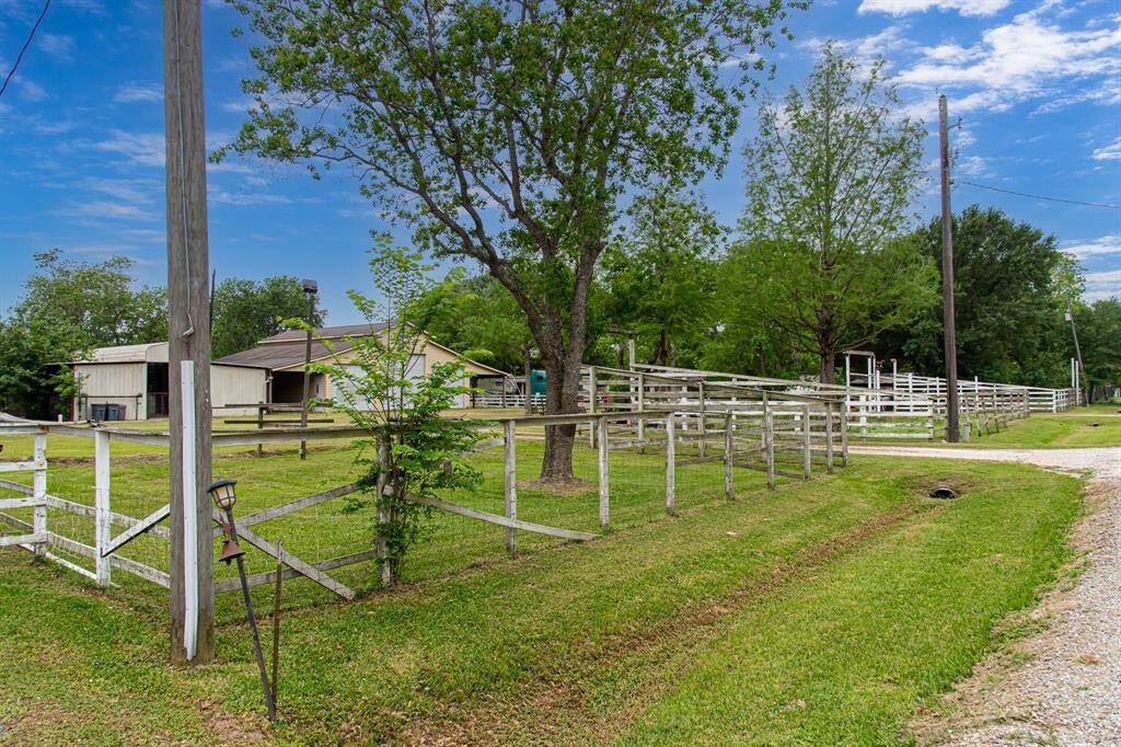 View of large workshop and horse stalls immediately to the left.