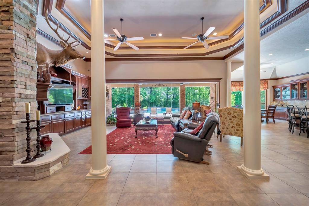 Look at Your Stunning Entry, always a Beautiful view through to the outdoors with the Wall of Butt Glass In Living and Dining.