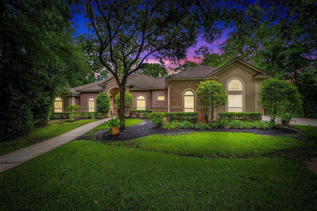 This Stunning Custom Built Home Is full of endless features starting with great Curb Appeal, Lush Landscaping, Stucco and Brick Exterior, Double Pane Vinyl Windows