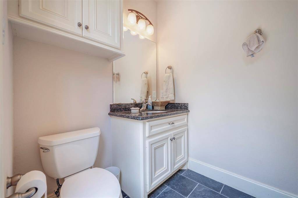 And Pool Cabana Bath With Granite Vanity Top, Tile flooring and Cabinetry for Essentials.