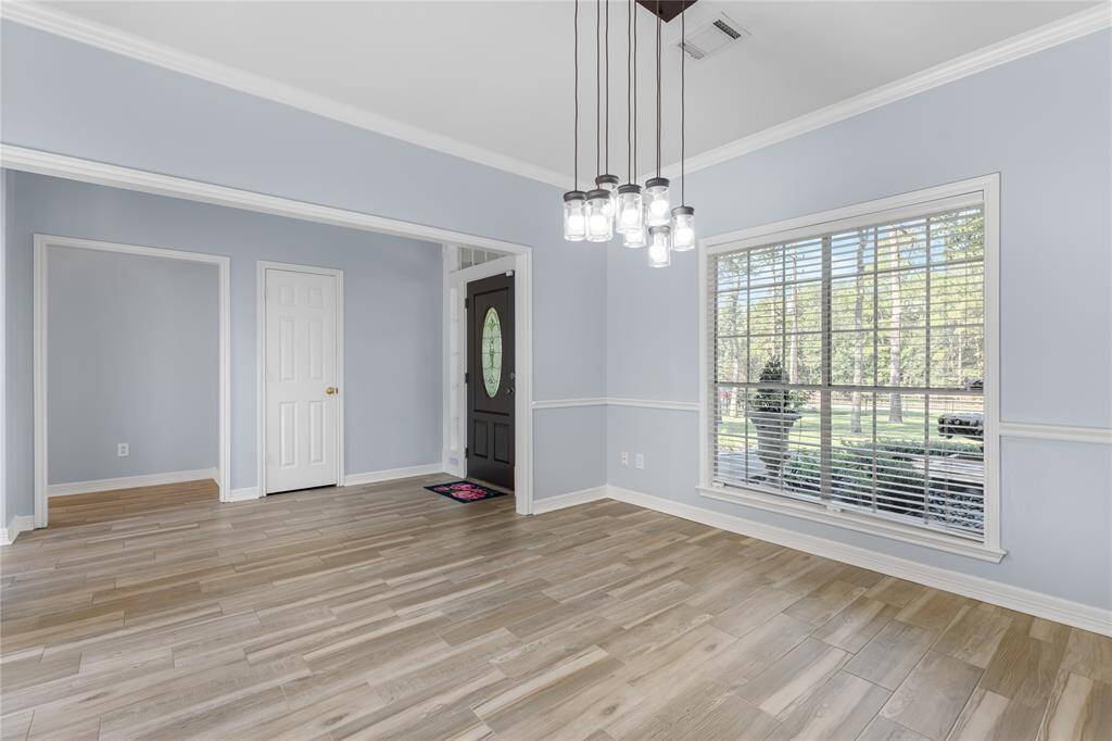 Dining room with tons of light and plenty of room for seating!