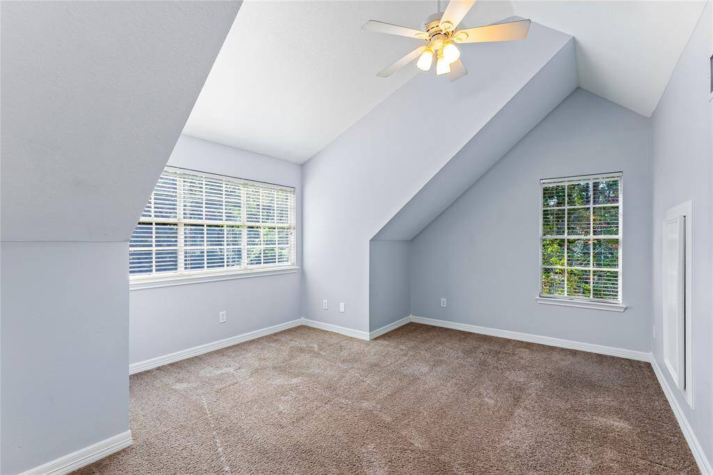 Secondary room offers endless possibilities of an office, bedroom or more!  Open and bright with high ceilings.