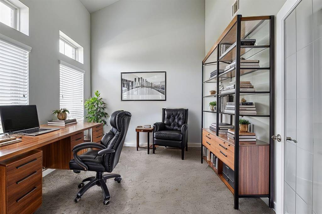 This bright, airy home office offers the ideal space for remote work, study, or creative pursuits. High ceilings and large windows fill the room with natural light, while French doors provide a quiet and private retreat. Imagine the productivity you’ll achieve in this peaceful setting, complete with modern touches that make working from home both comfortable and inspiring.