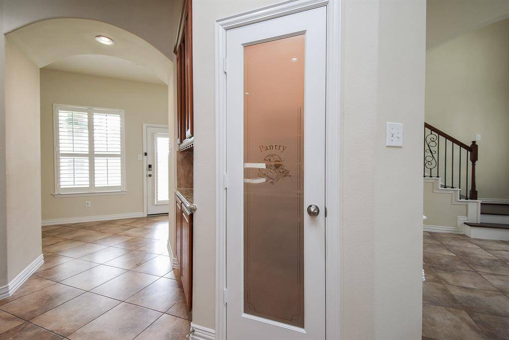 Charming glass pantry door.