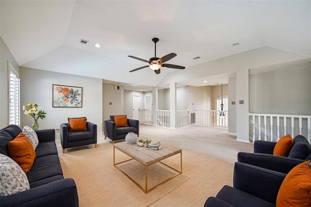 BRIGHT GAME ROOM WITH NEUTRAL TONES AND PLENTY OF ROOM FOR ENTERTAINING. **This room has been virtually staged.