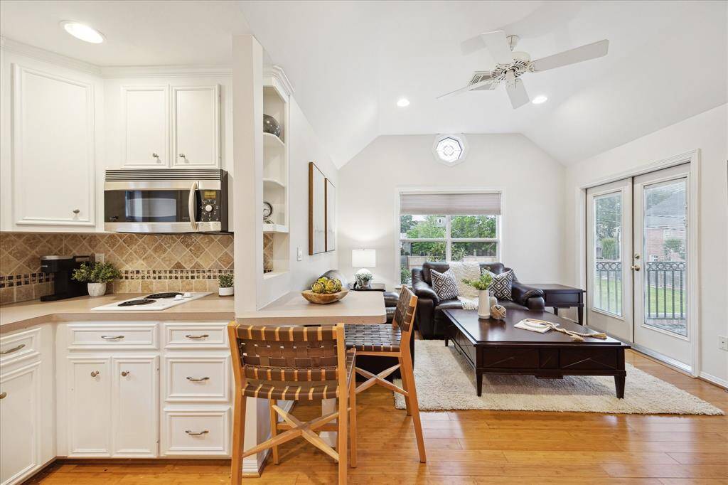 GARAGE APARTMENT.   One of the best garage apartments in the neighborhood!  It's more than a space above the garage as it has been turned into an actual apartment with living, kitchen and bedroom spaces.  Reminiscent of a Rosemary Beach carriage house.