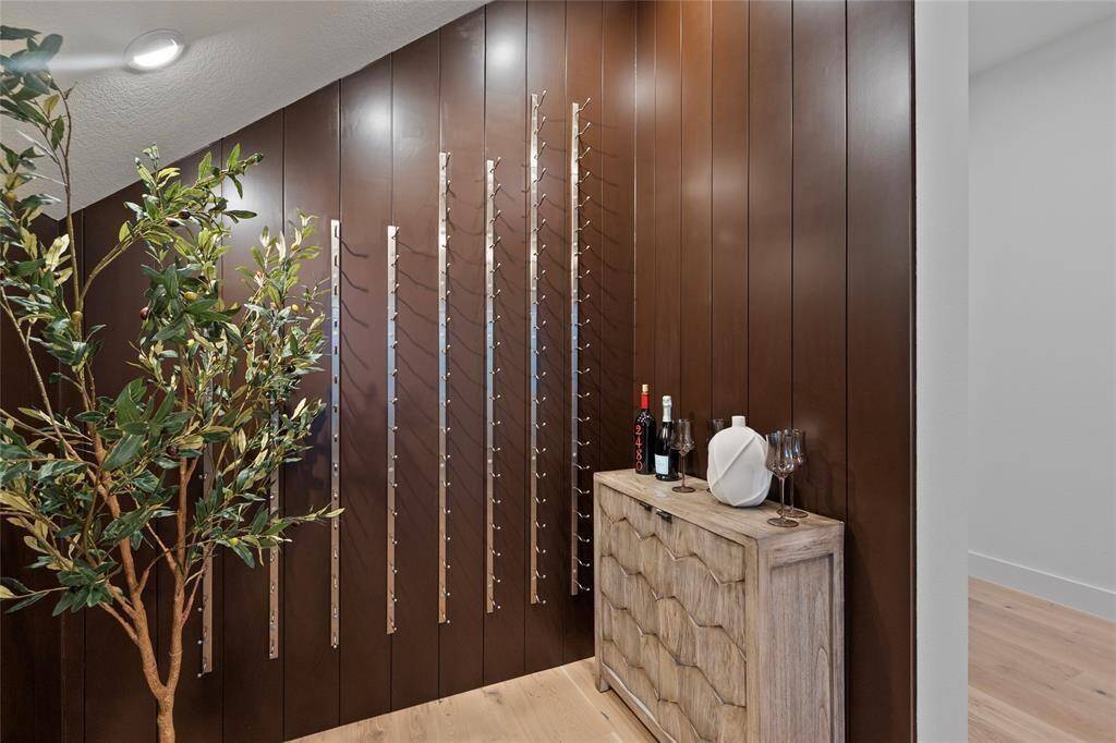 Wine wall- check out the hidden storage behind the tree
