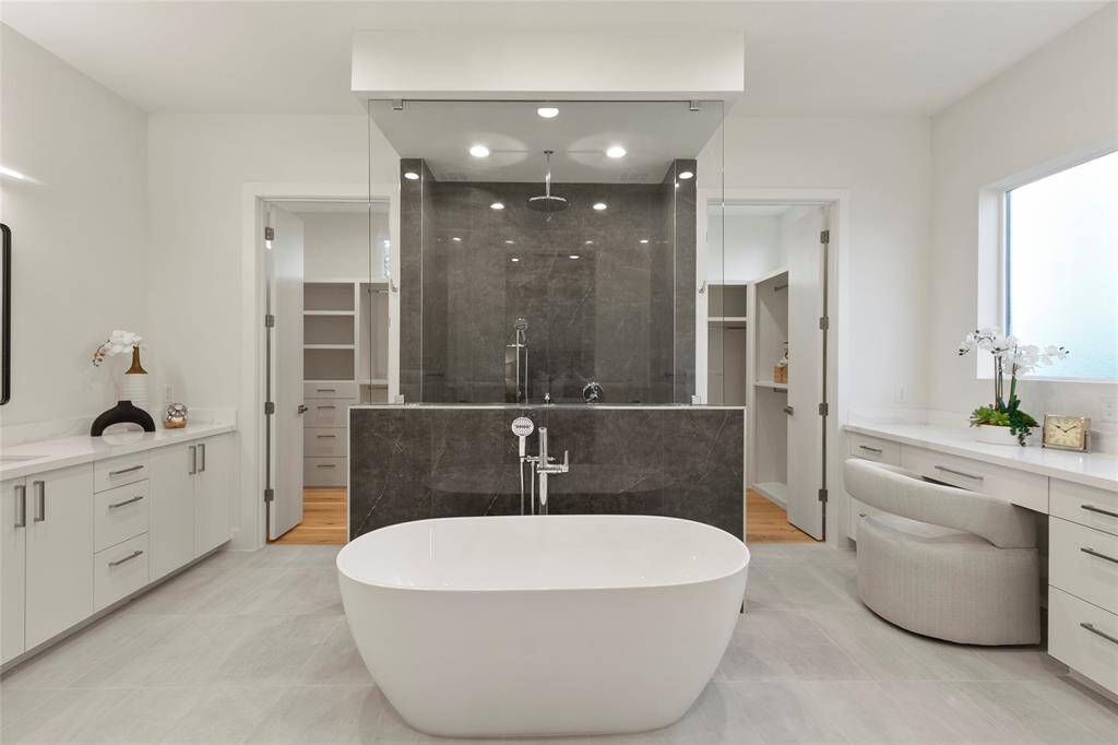 Luxury primary bedroom bath with spa tub