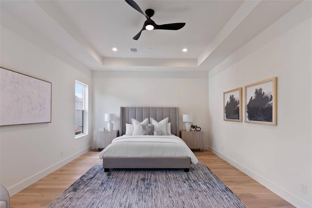 Another view of the primary bedroom