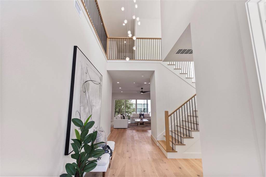Entry way with double ceiling and one of a kind UNIQUE chandelier