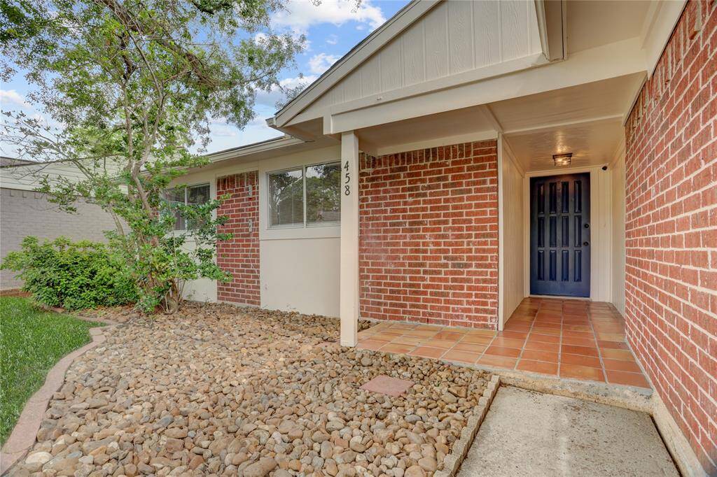 As you walk up to this home, you are greeted with a lovely covered porch and fresh exterior paint