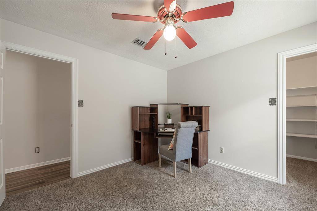 Secondary bedroom. Note - closet has built-ins.