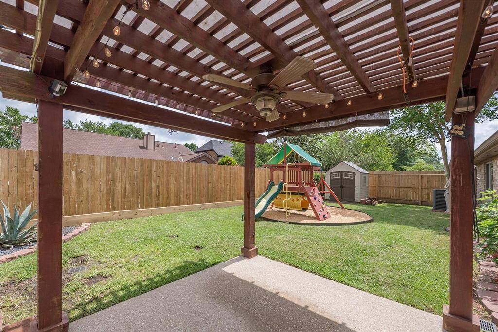 Pergola with lighted ceiling fan& lights.