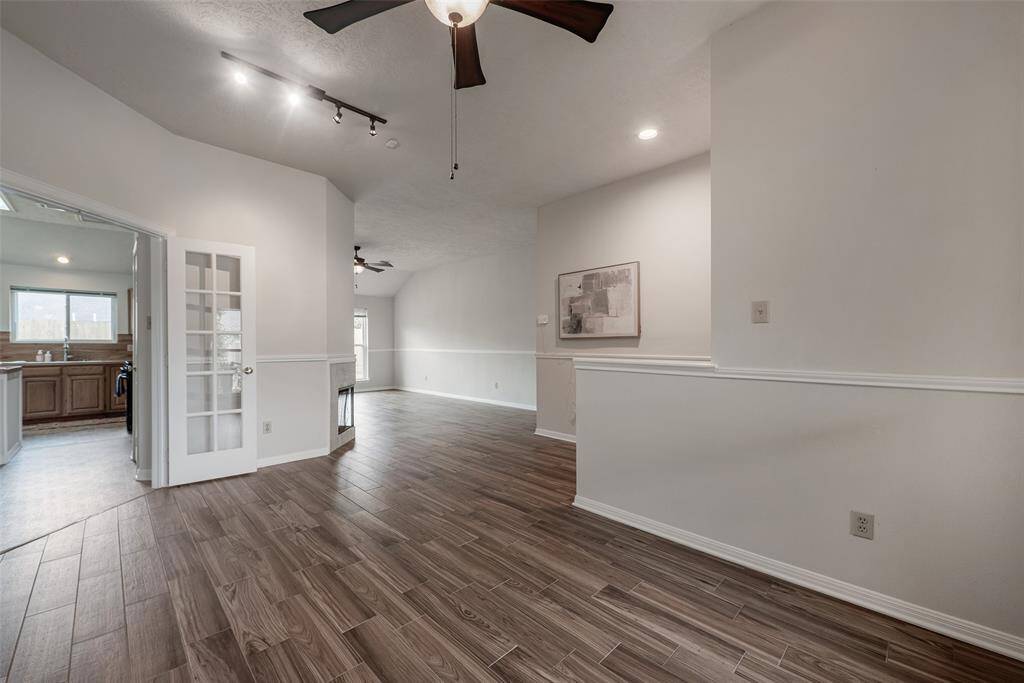 French doors also open into the kitchen & breakfast area.