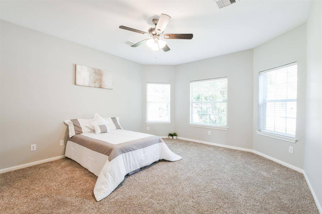 HUGE PRIMARY BEDROOM WITH BAY WINDOWS!