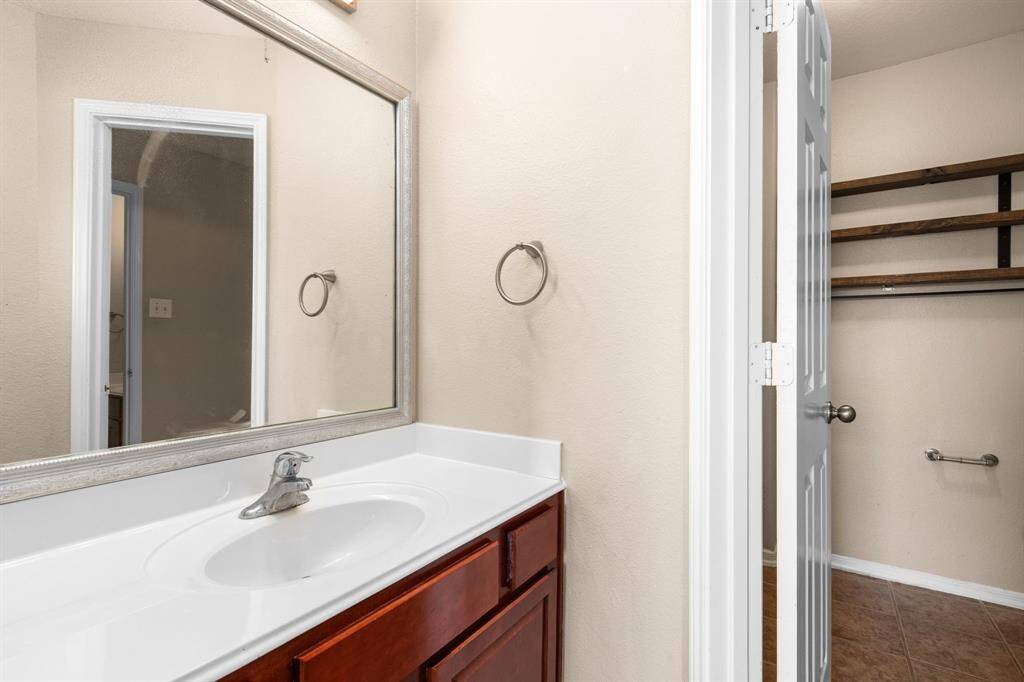 The Jack-and-Jill upstairs bath allows for easy sharing.