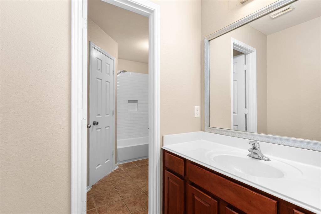 The tub/shower and toilet are separated, allowing for use when someone wants to access their sink area. This also allows guest access on the second floor from the hallway.