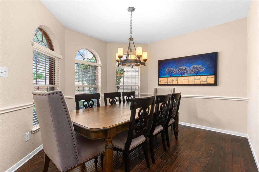 The spacious formal dining room overlooks the front yard, and is adjacent to the butlers pantry for ease of access when serving a large group.
