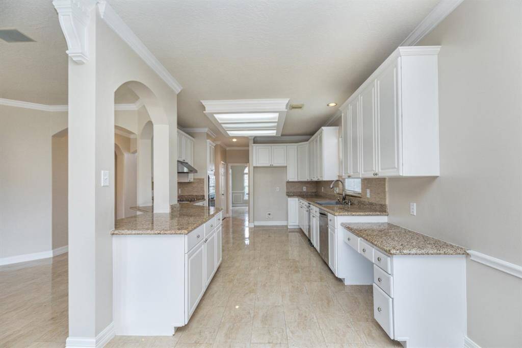 Kitchen: lots cabinets and one built-in desk