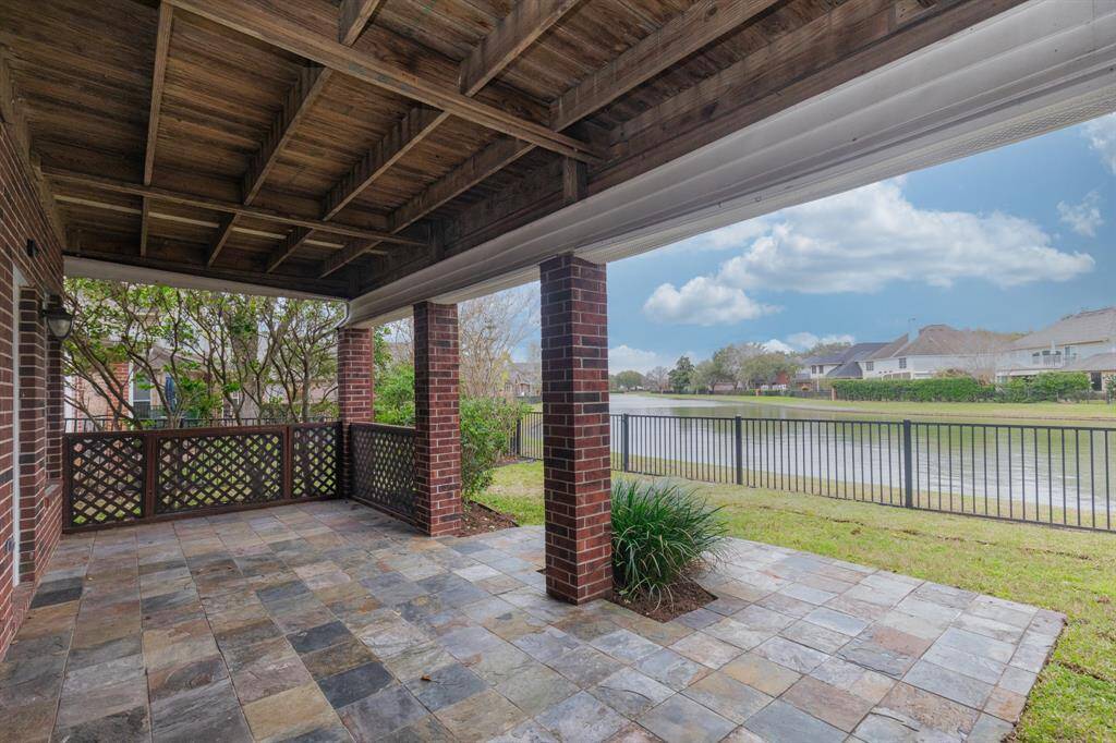 Downstairs cover porch by the lake