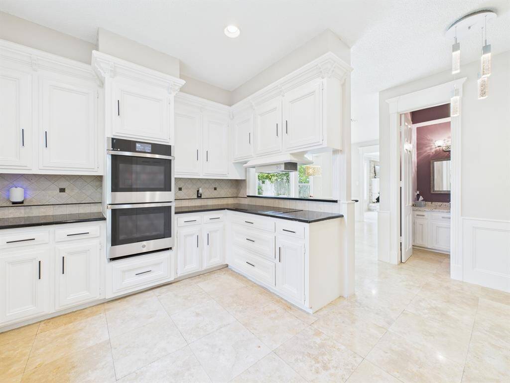 Off the Kitchen is a Beautiful Powder Room & Breakfast Room