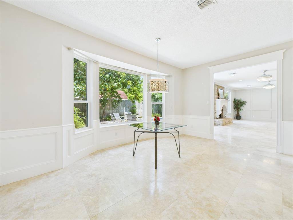 Beautiful Breakfast Room with Views of the Backyard