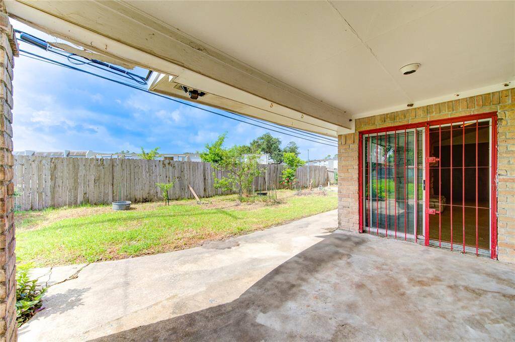 Spacious backyard patio perfect for outdoor relaxation and entertaining.