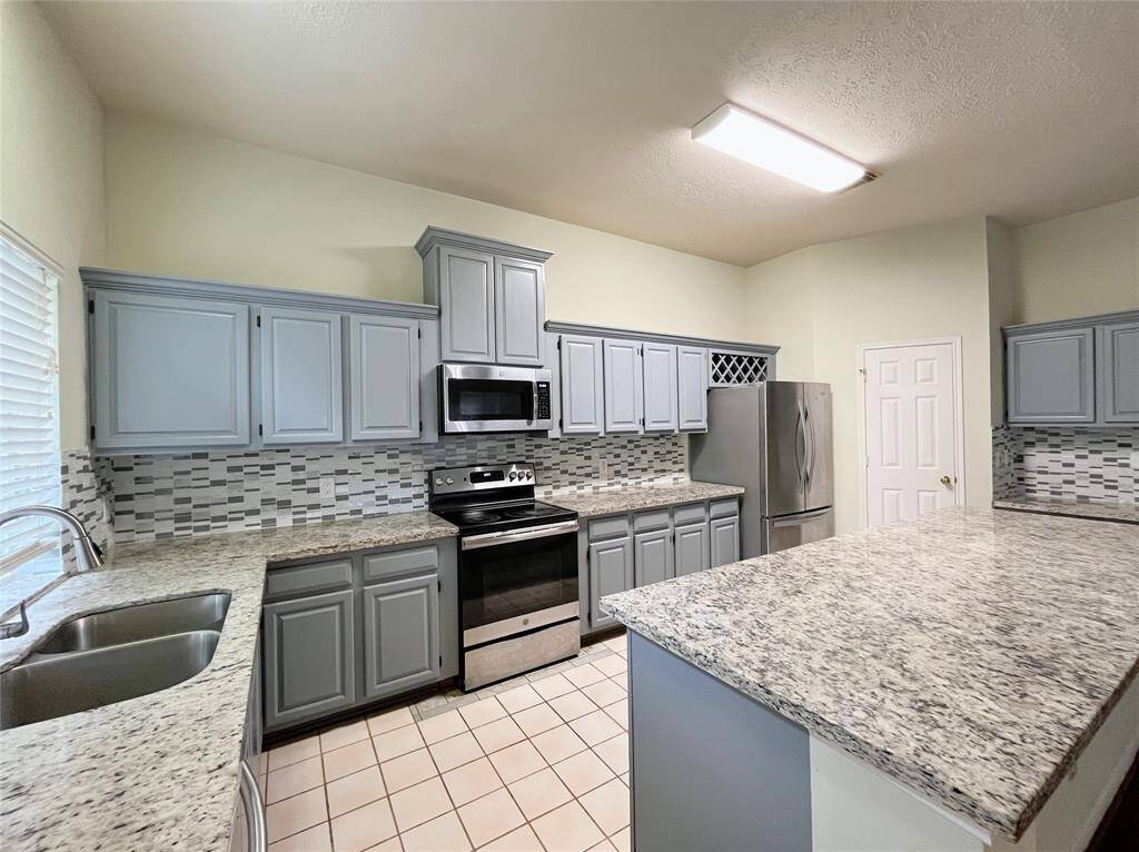 Kitchen with a Granite Countertops