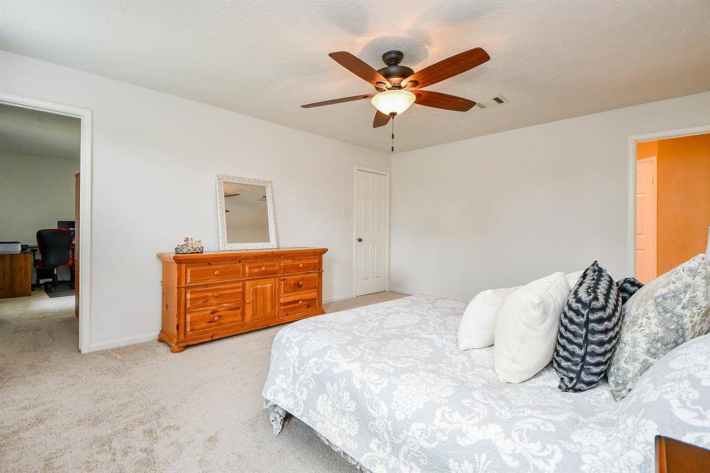 It has a connecting door to another adjacent room and is convenient for a nursery or home office.
