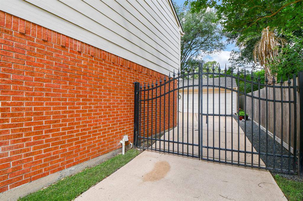 Manual security gate. Across the street is the elementary school!