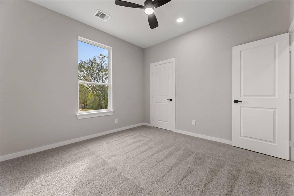Another view of the first bedroom. A spacious and flexible room ready to be customized to suit your needs.