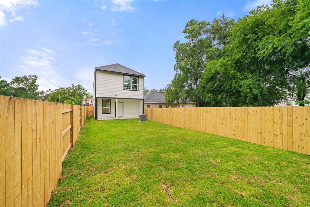 Spacious and private backyard retreat. Enjoy the serenity of this expansive, fully-fenced yard, perfect for relaxation, outdoor play, or entertaining guests. With lush grass and privacy on all sides, it’s your personal oasis.