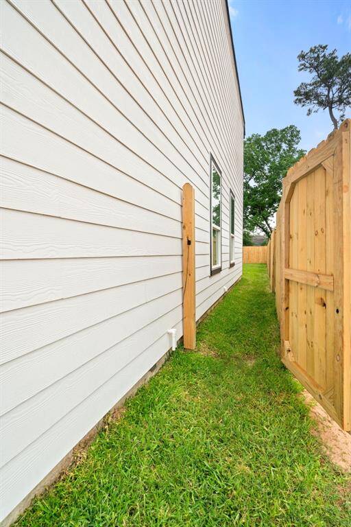 Easy side access to your private backyard! This convenient side entrance offers quick, private access to your fully-fenced backyard. Ready to see it for yourself? Schedule your private showing today and experience all the possibilities this home has to offer!