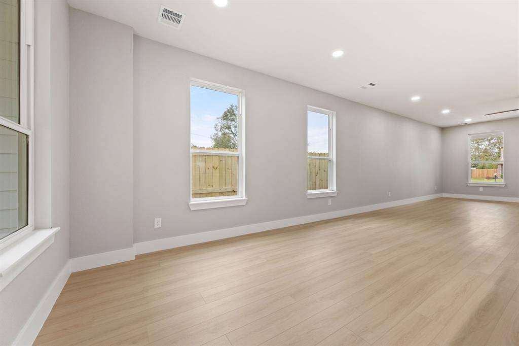 Dining area with a view. Enjoy meals with your loved ones in this spacious dining area, easily accessible from the kitchen for seamless entertaining.