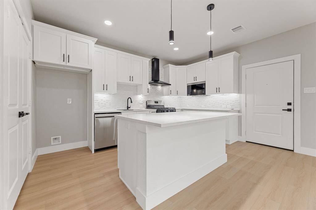 Perfect space for entertaining. Imagine hosting your next gathering here—plenty of room for guests to mingle and enjoy.