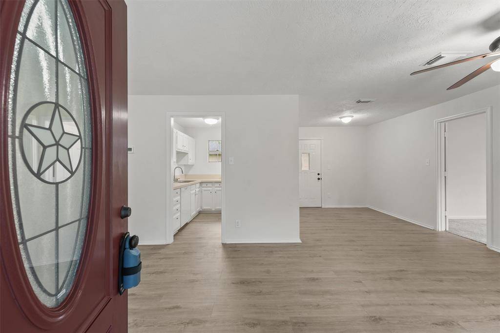 Inviting new front door enhances curb appeal and welcomes you home.