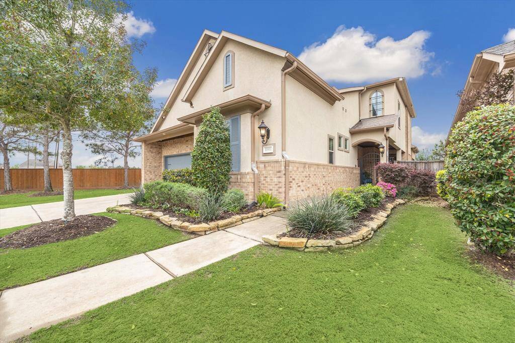 Front Elevation - Timeless Design including Full Brick and Stucco.