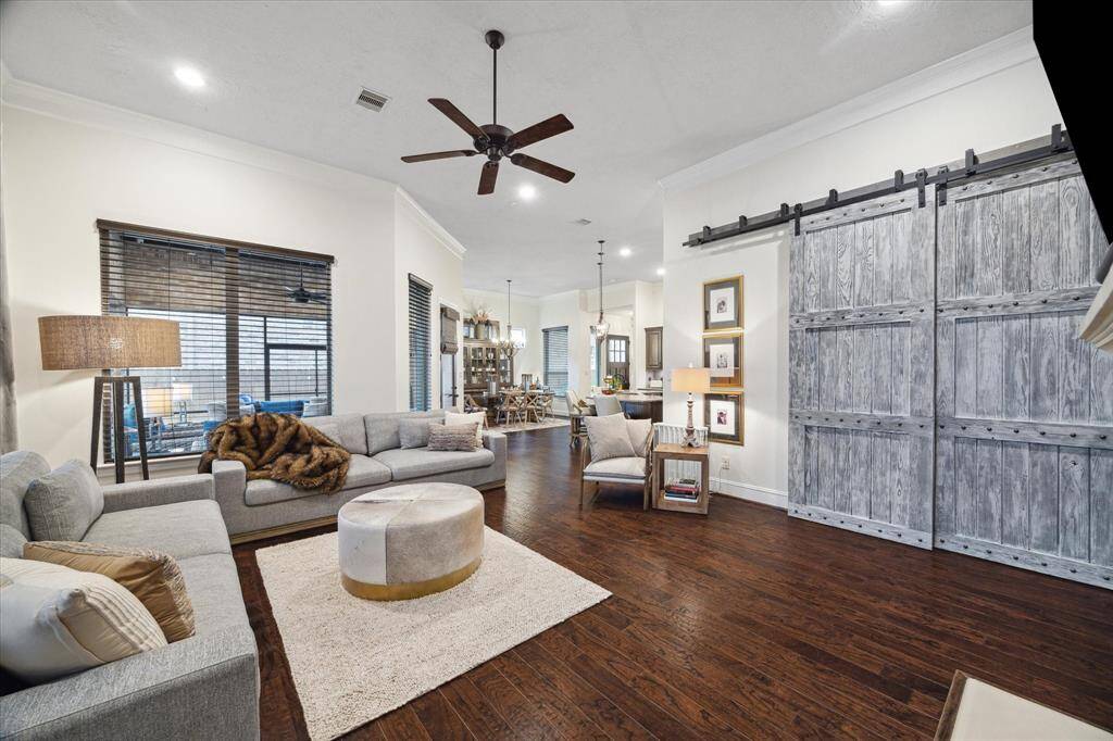 Custom sliding doors lead to Home Office/Study.