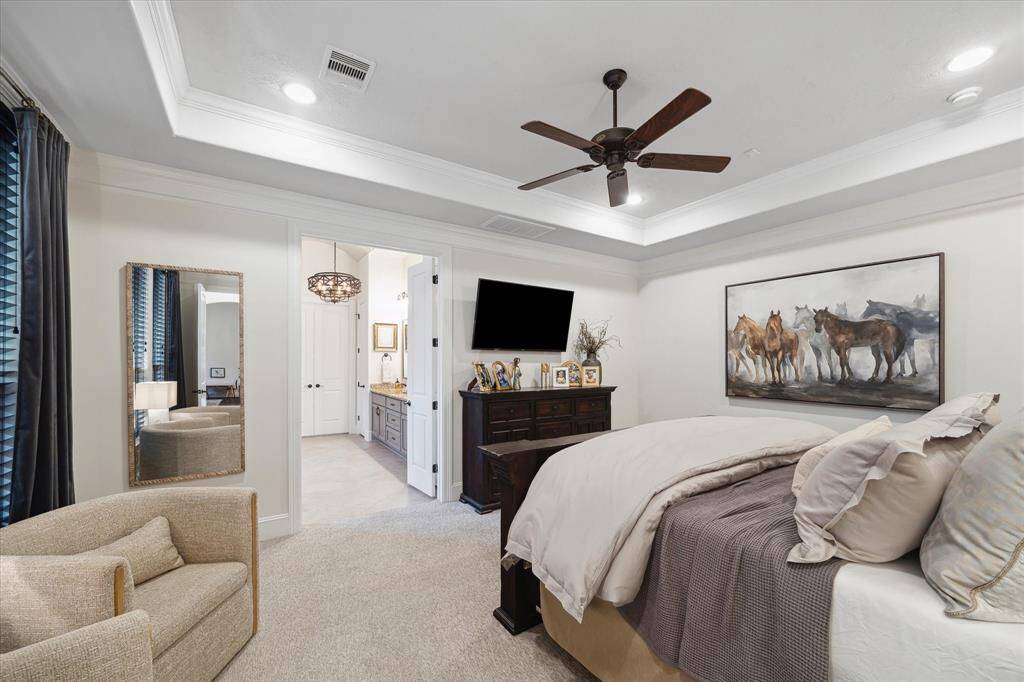 Spacious Primary Bedroom with room for additional seating.
