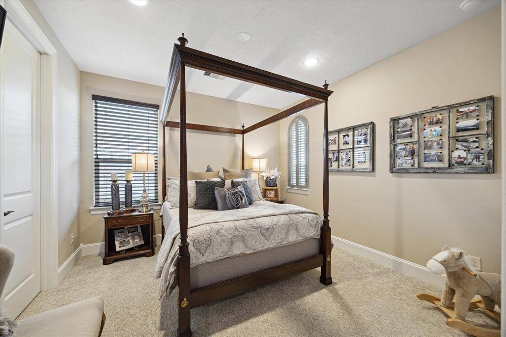 Secondary Bedroom on 2nd floor with ensuite bath and walk in closet.
