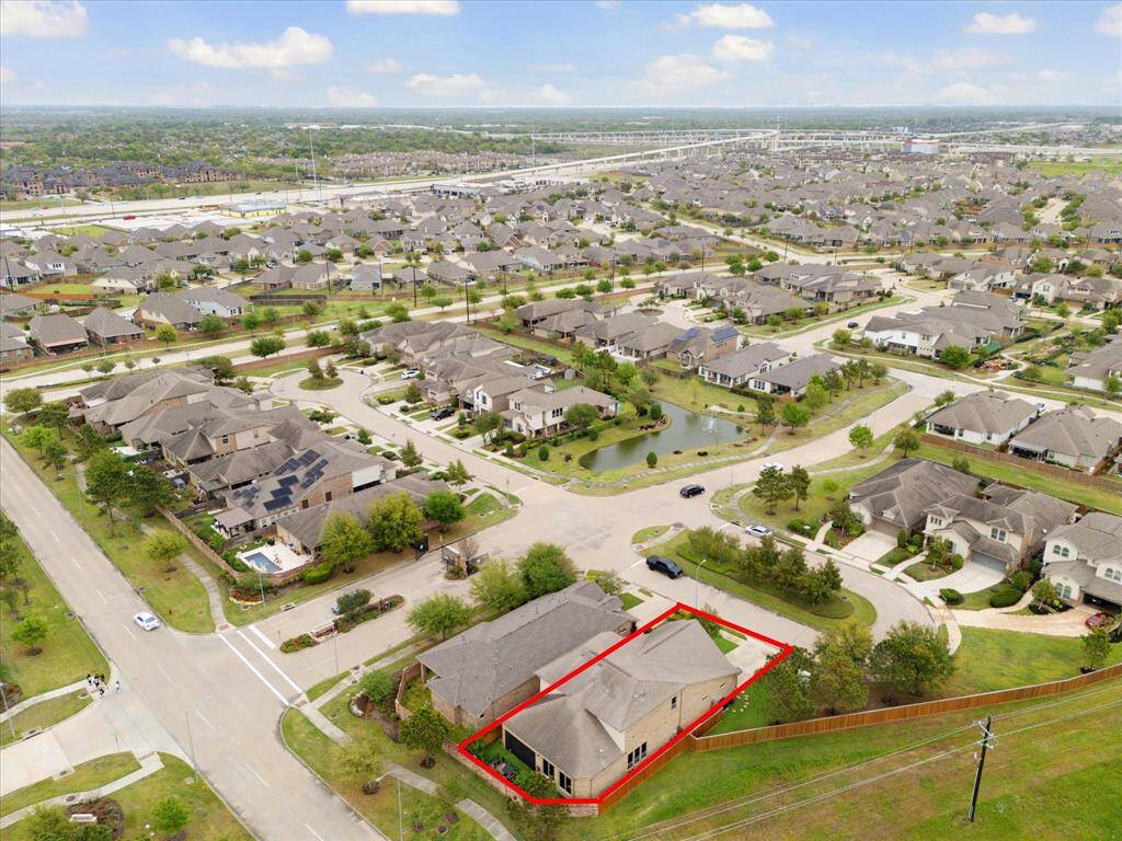 Aerial view showing prime location of home on a cul-de-sac; adjacent to green spaces.