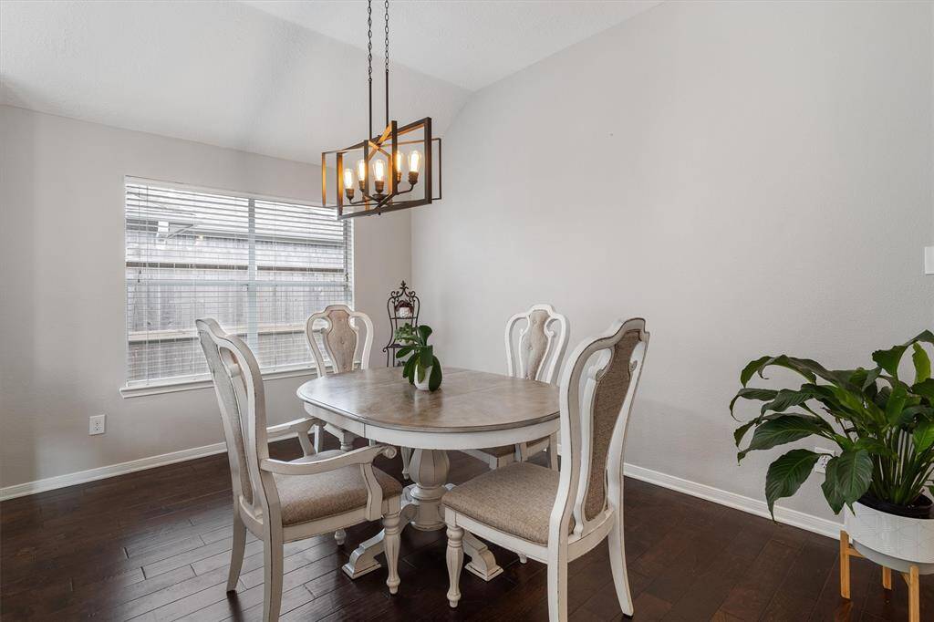 FORMAL DINING AT ENTRY WITH FRESH PAINT AND ENGINEERED WOOD FLOORING