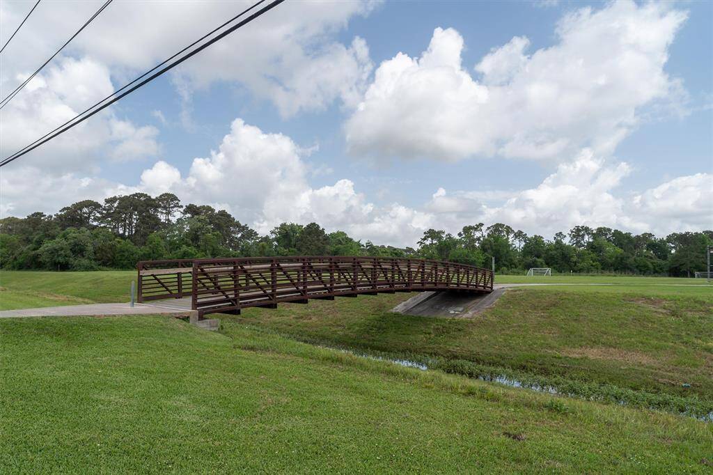 BRIDGE GOES TO HUGE FIELD THAT USED TO BE A NEIGHBORHOOD BASEBALL FIELD - GREAT PLACE TO HIT BALLS!