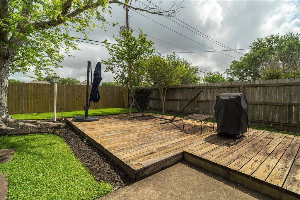 COME RELAX ON THIS HUGE DECK - QUIET AND PEACEFUL WITH NO BACK NEIGHBORS AND BEAUTIFUL SHADE TREES!
