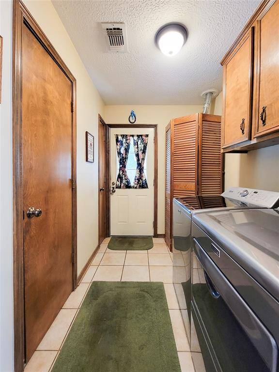 The half bath or powder room is located in the mud room.