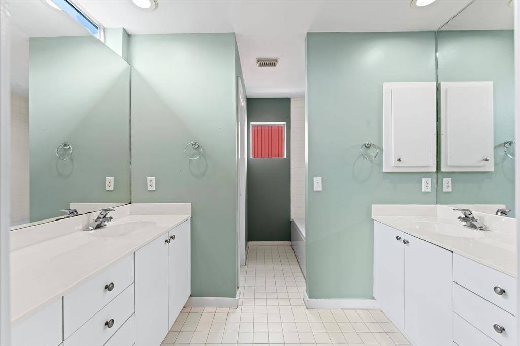 Dual sinks in the  primary bathroom.