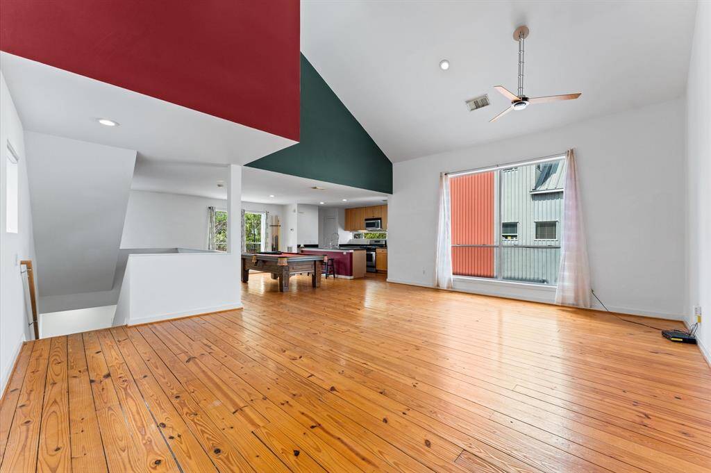 Open-concept living space filled with natural light.